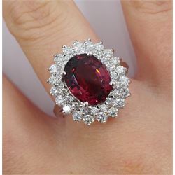 White gold oval tourmaline and round brilliant cut diamond cluster ring, stamped 14K, total diamond weight approx 1.70 carat, tourmaline approx 6.00 carat