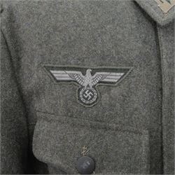 WWII German Third Reich field tunic, with Edelweiss insignia to the sleeve, eagle with swastika and collar tabs 