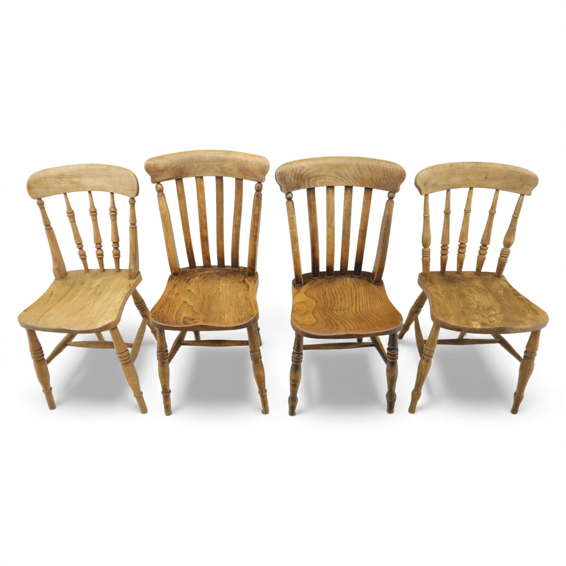Eight Victorian farmhouse chairs in elm and beech, spindle-back frames with moulded seats, on turned and plain supports