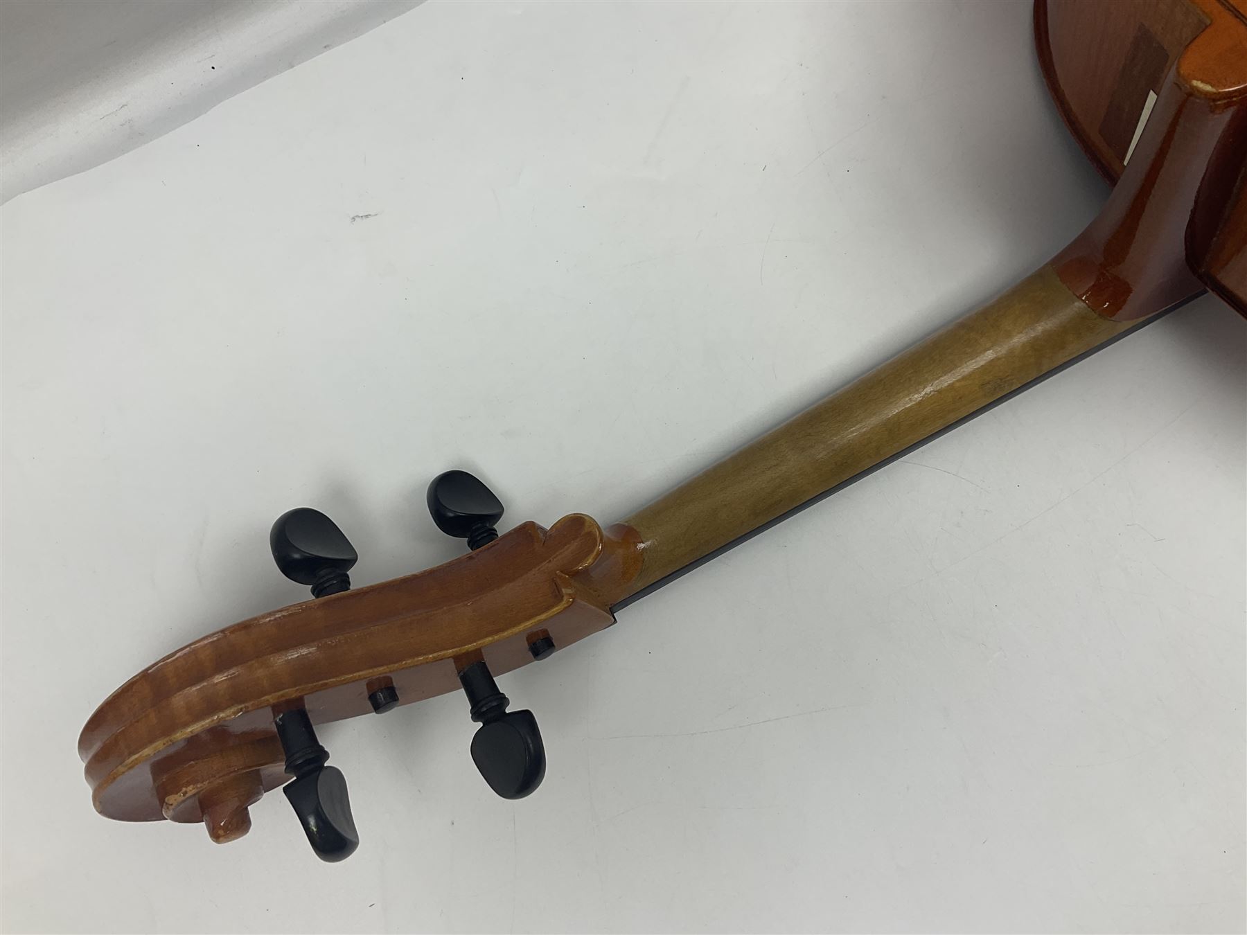 German half-size cello with 69cm two-piece maple back and ribs and spruce top; L112.5cm overall; in soft carrying case with two bows