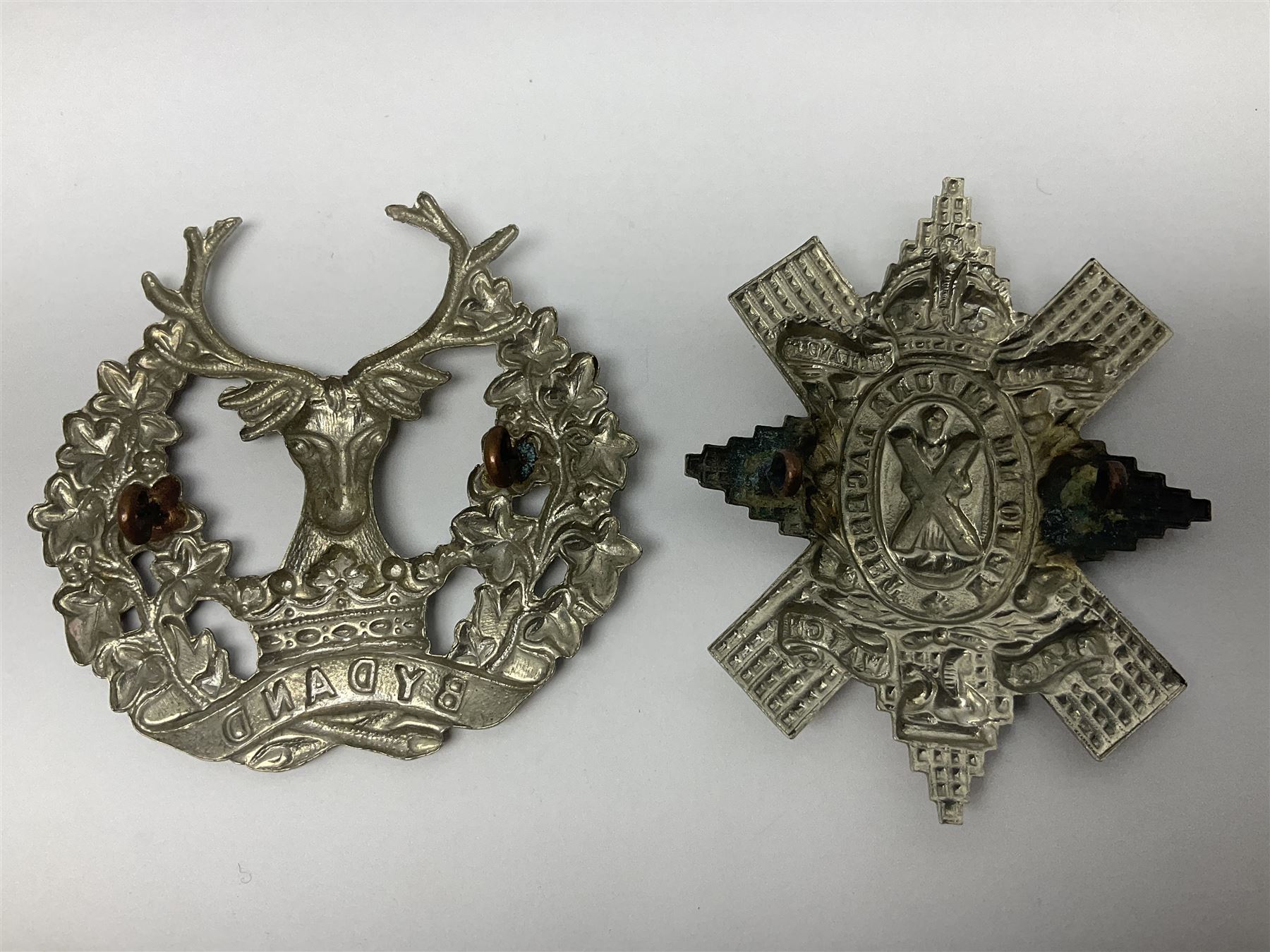 Thirteen Scottish metal Glengarry badges including Black Watch, Highland Regiment, Cameronians, Argyll & Sutherland, Seaforth Highlanders, Kings Scottish Own Borderers etc