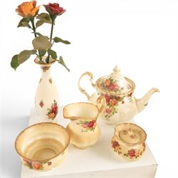 Royal Albert Old Country roses part tea and dinner service, including teapot, milk jug, open sucrier, cake stand, six dinner plates, etc
