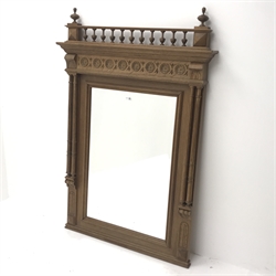  Classical carved oak framed pier glass mirror fitted with bevel edged glass, gallery top rail with finials, flower head carved frieze, two turned and fluted pilasters, W93cm, H137cm  