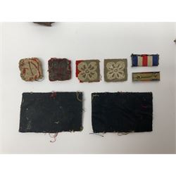 WW2 German Luftwaffe Mess cutlery comprising table spoon and fork, each with H.M.Z.38 mark; WW1 British War Medal awarded to L-13858 Gnr. J. McCabe R.A.; and small quantity of military badges, rank pips etc