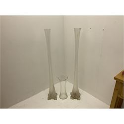 20th century pair of tall clear glass vases, of slender form, H120cm, and another smaller vase