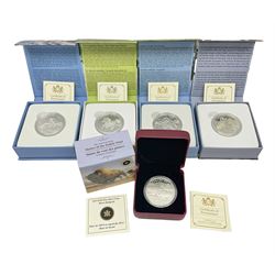 Five Royal Canadian Mint fine silver one-hundred dollar coins, comprising 2013 'The American Bison Master of the Prairie Wind', 2014 'The Majestic Bald Eagle', 2014 'Solitary Titan The Grizzly', 2014 'Clashing Totans of the Wind-Swept Crag The Rocky Mountain Bighorn Sheep' and 2015 'The Canadian Horse The Little Iron Horse', all cased with certificates