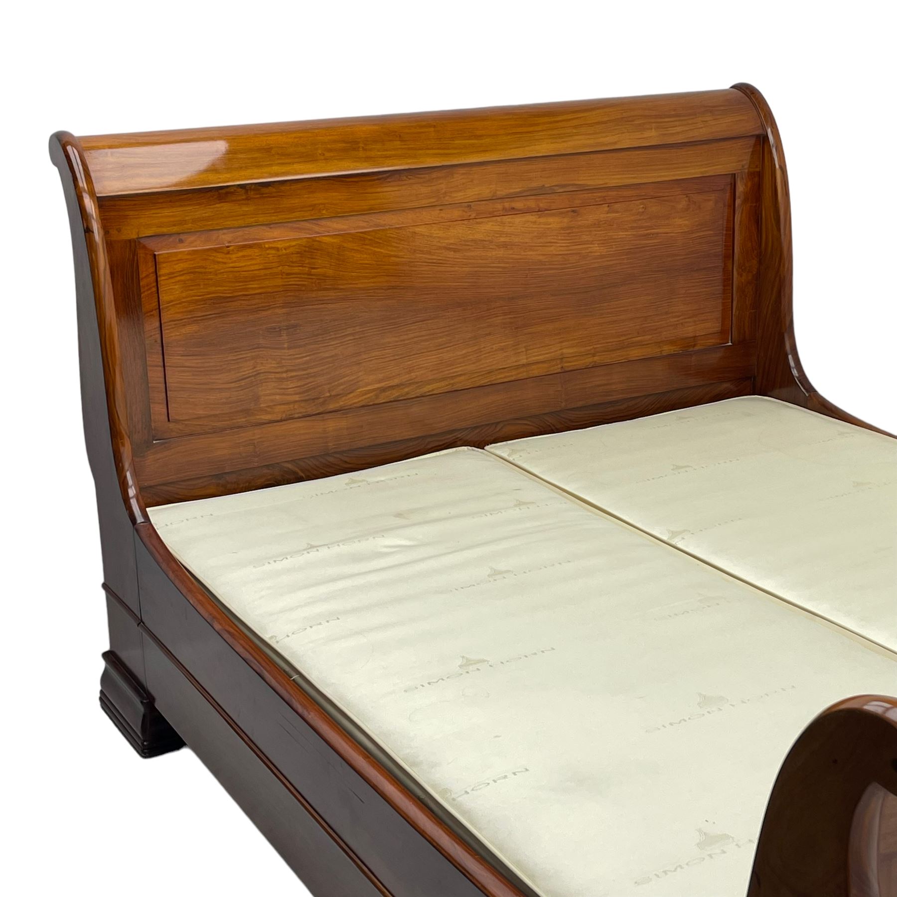 Simon Horn - 'Chatsworth' hardwood 5' 3'' Queen-size sleigh bed or lit bateau, panelled head and footboard with scrolled frames, on moulded block feet, with upholstered base