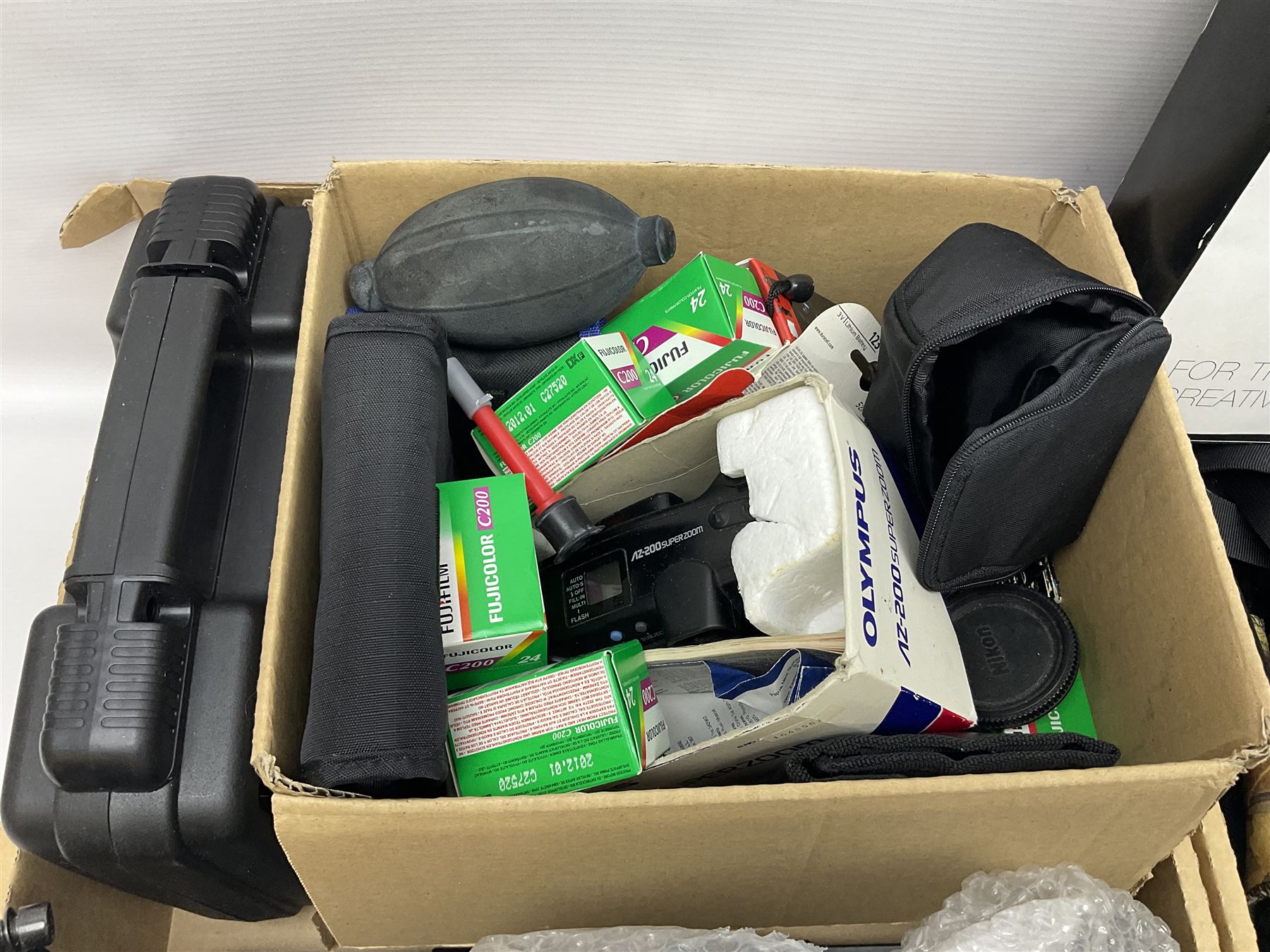 Rocwing photography studio lighting stands and shades, together with digital cameras and other camera equipment, in three boxes  