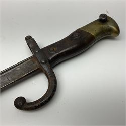 Two 19th century French model 1874 epee bayonets, each with 52cm steel blade, and armoury dates for 1880 and 1881 L64cm overall (2)