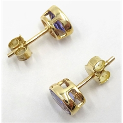  Pair of gold oval tanzanite stud ear-rings hallmarked 9ct   