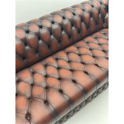 Large four seat Chesterfield sofa upholstered in buttoned brown leather, buttoned seat and back 