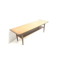 Teak rectangular coffee table, square tapering supports joined by solid undertier