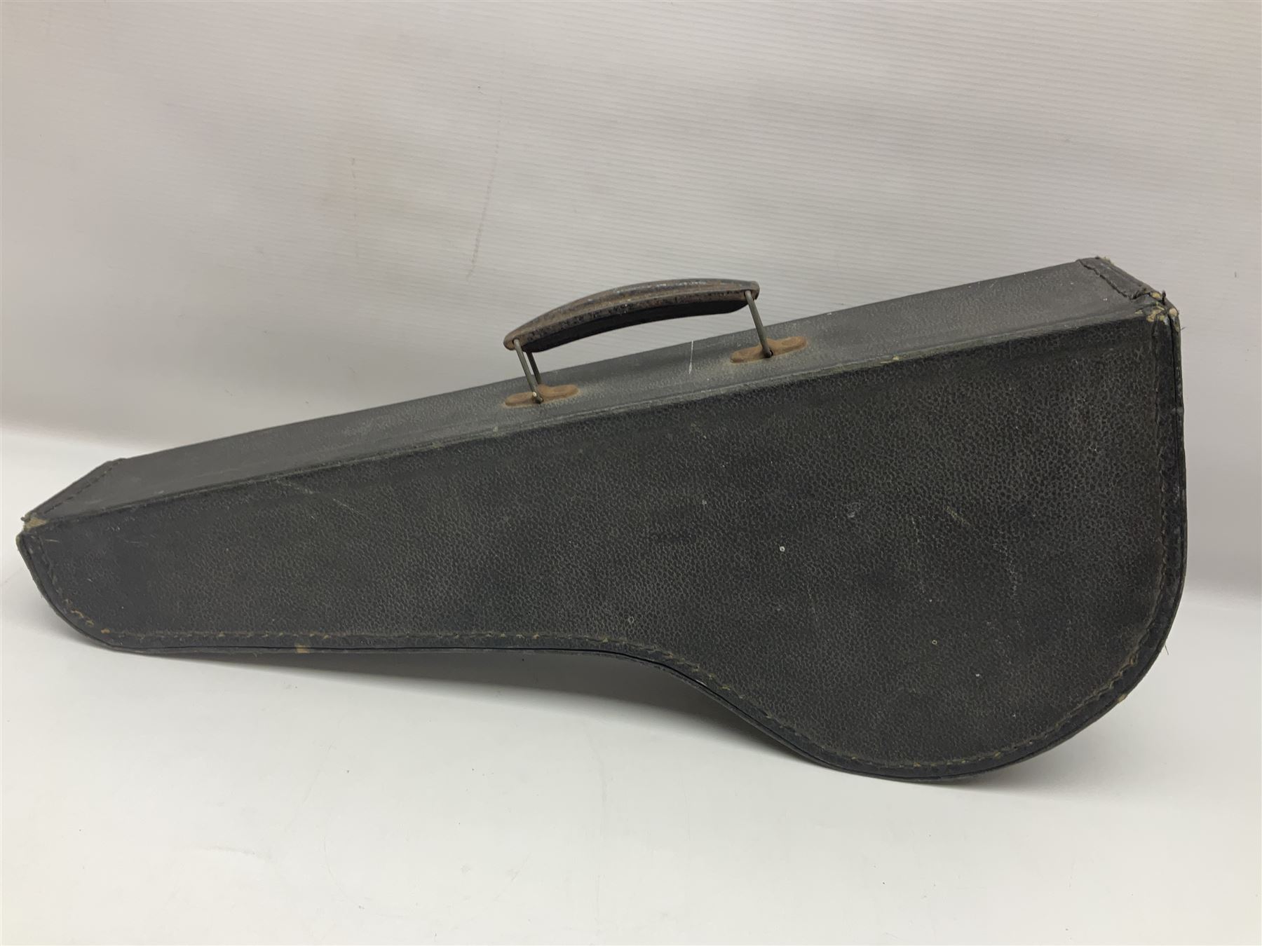 George Formby banjolele with metal plaque to headstock L55cm; in carrying case with instruction booklet.