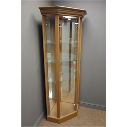  Oak finish illuminated corner display cabinet, enclosing four glass shelves, two full length display mirrors, plinth base, W81cm, H184cm, D60cm  