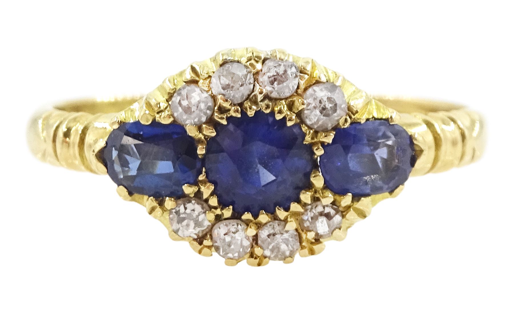 Early 20th century 18ct gold three stone oval cut sapphire and eight stone diamond cluster ring, Chester 1916