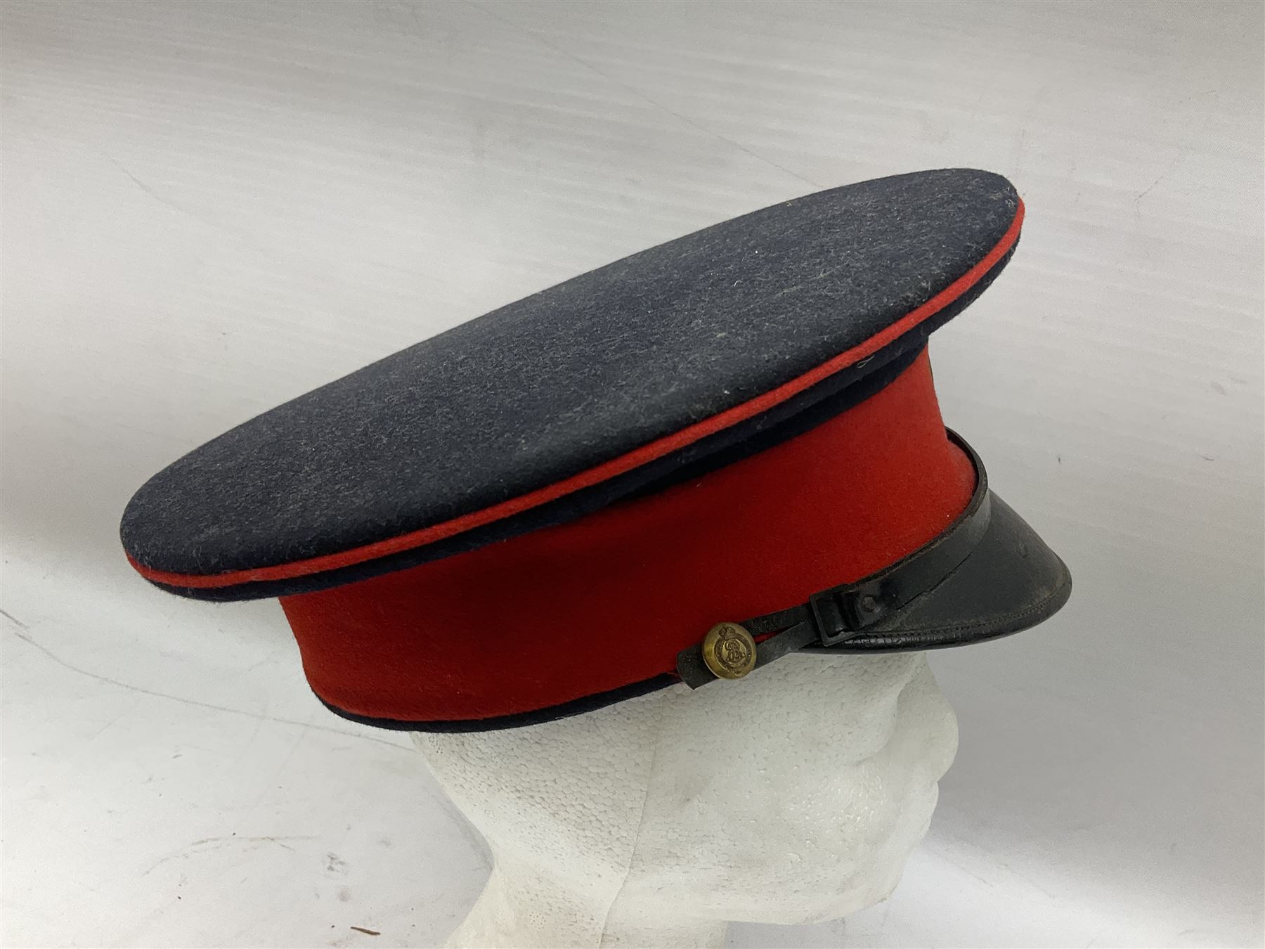 Royal Military College Sandhurst parade uniform with peaked cap and two-piece mess dress, all bearing historic manuscript labels for J.E.A. Baldwin, possibly Air Marshal Sir John Eustace Arthur Baldwin (1892-1975) who served in the British Army 1910-18 & 1944-58 and in the RAF 1918-44.