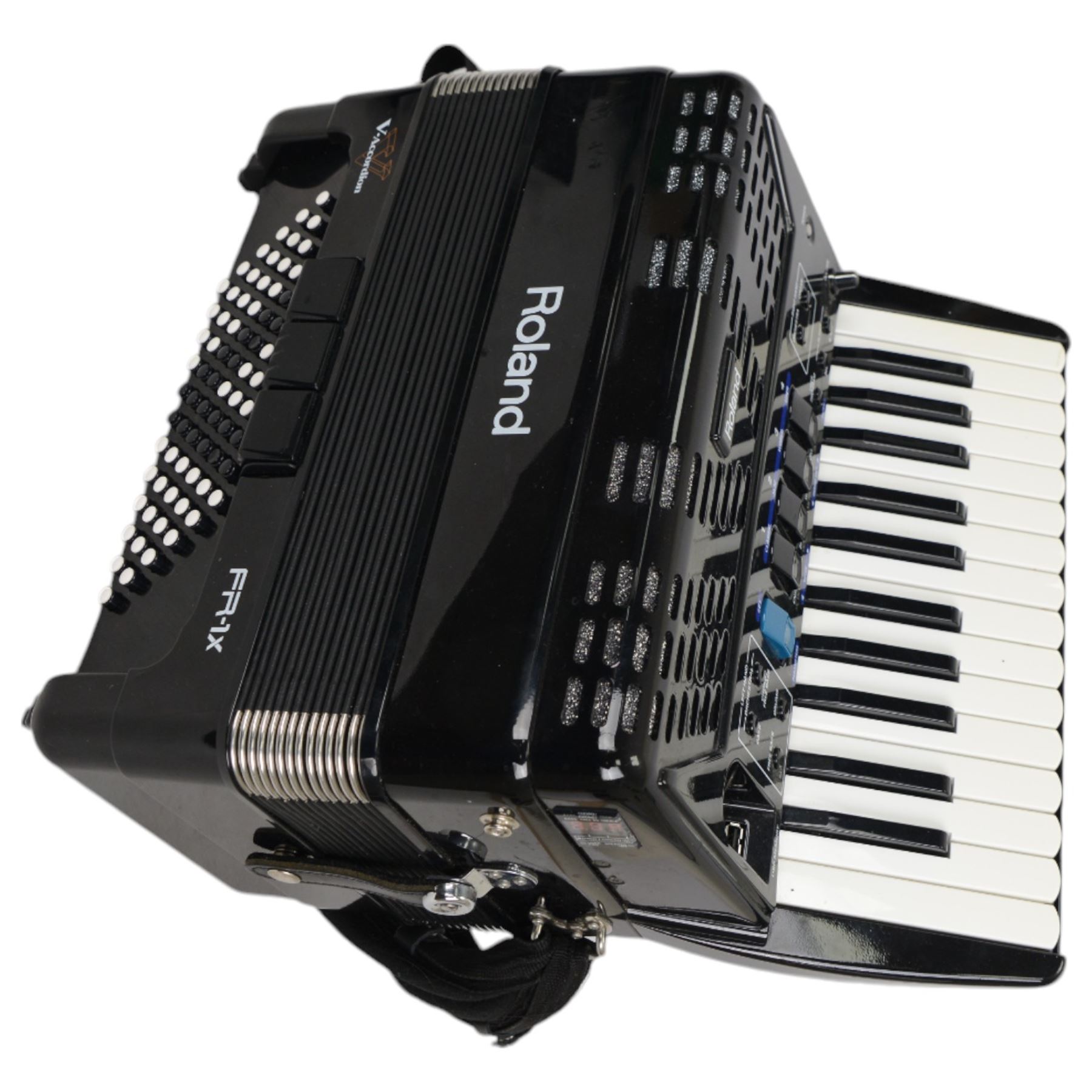  Roland FR-1X piano accordion (uncased)13 fold bellows two octave keyboard with 26 keys, 72 buttons, classic, jazz,ensemble, brass, wind, piano, and guitar samples. With a Roland BK-7m Backing Module, leads and tutorials.