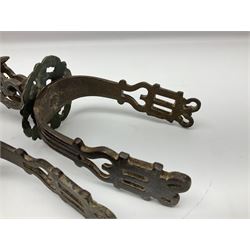 Pair of South American gaucho steel and brass spurs with eight-spike heel rowels, possibly Chilean L25cm