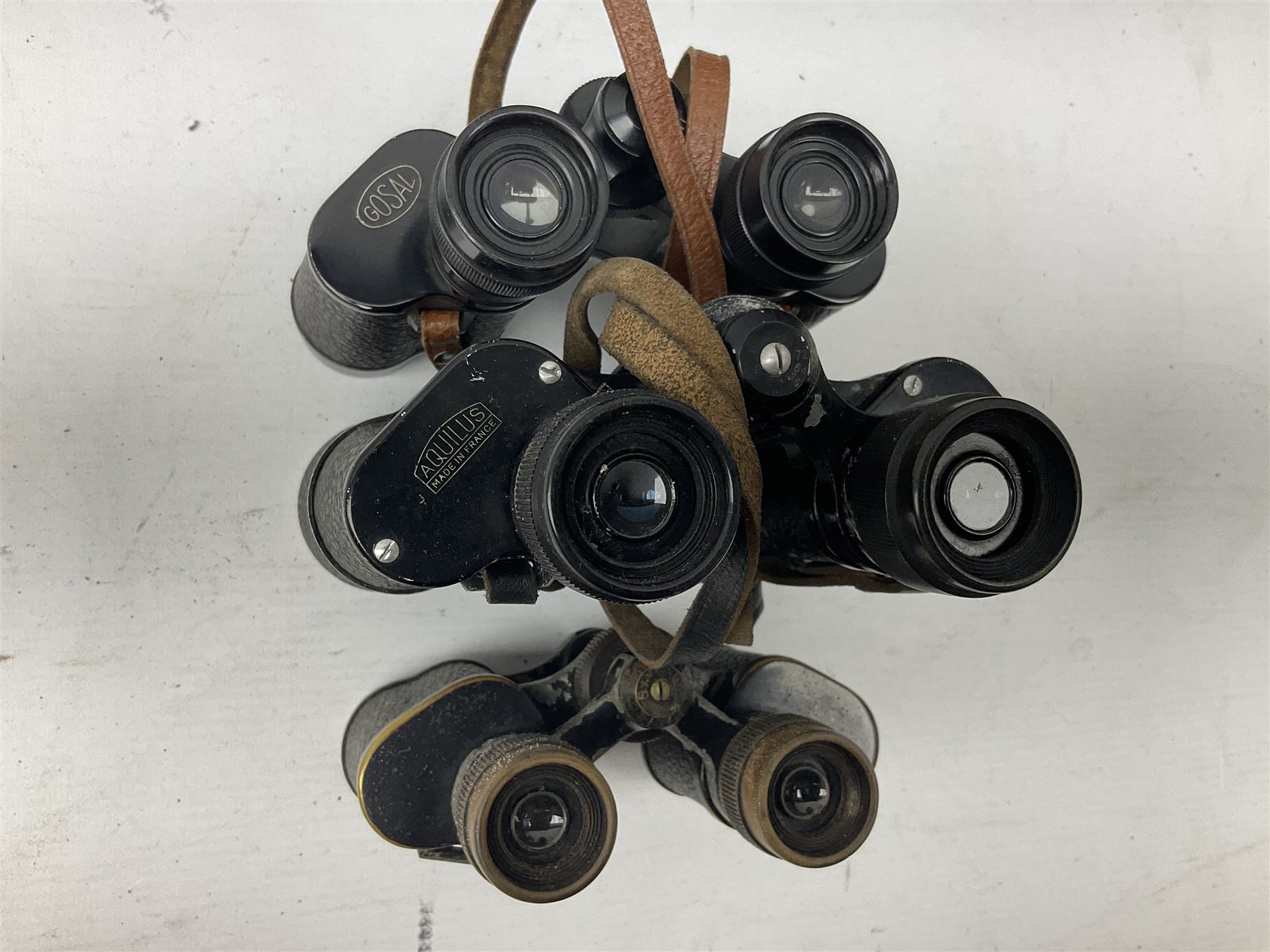 Eight cased pairs of binoculars, to include Zenith 10x50 field binoculars, Prinz 16x50, Prinzlux 10x50, Aquilus 10x35, etc, and a further binocular case