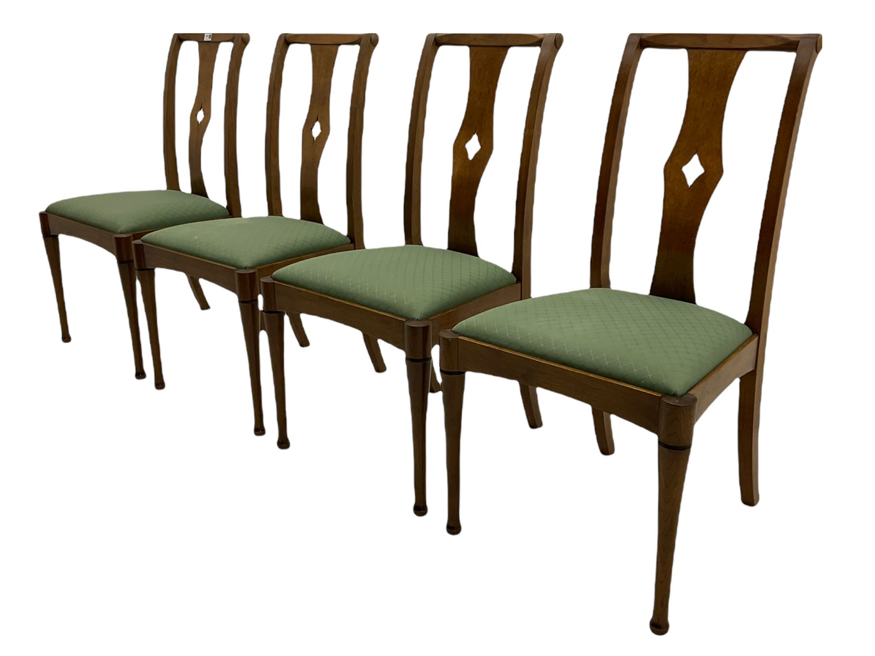 Set of eight contemporary walnut dining chairs, curved backs set with shaped splats with pierced detail, drop in upholstered seat cushions, on turned supports 