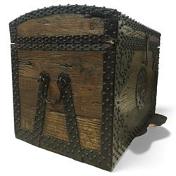 20th century Chinese camphorwood chest, the hinged lid opening to a plain interior, the exterior fitted with heavy iron strapwork, studded mounts and shaped corner plates, central circular lock escutcheon, with iron carrying handles
