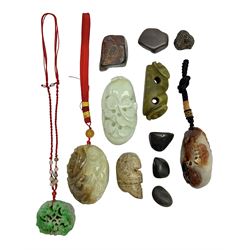 Chinese hardstone carving of a fish amongst coral, with platted rope handle, together with other hardstone and soft stone carvings  