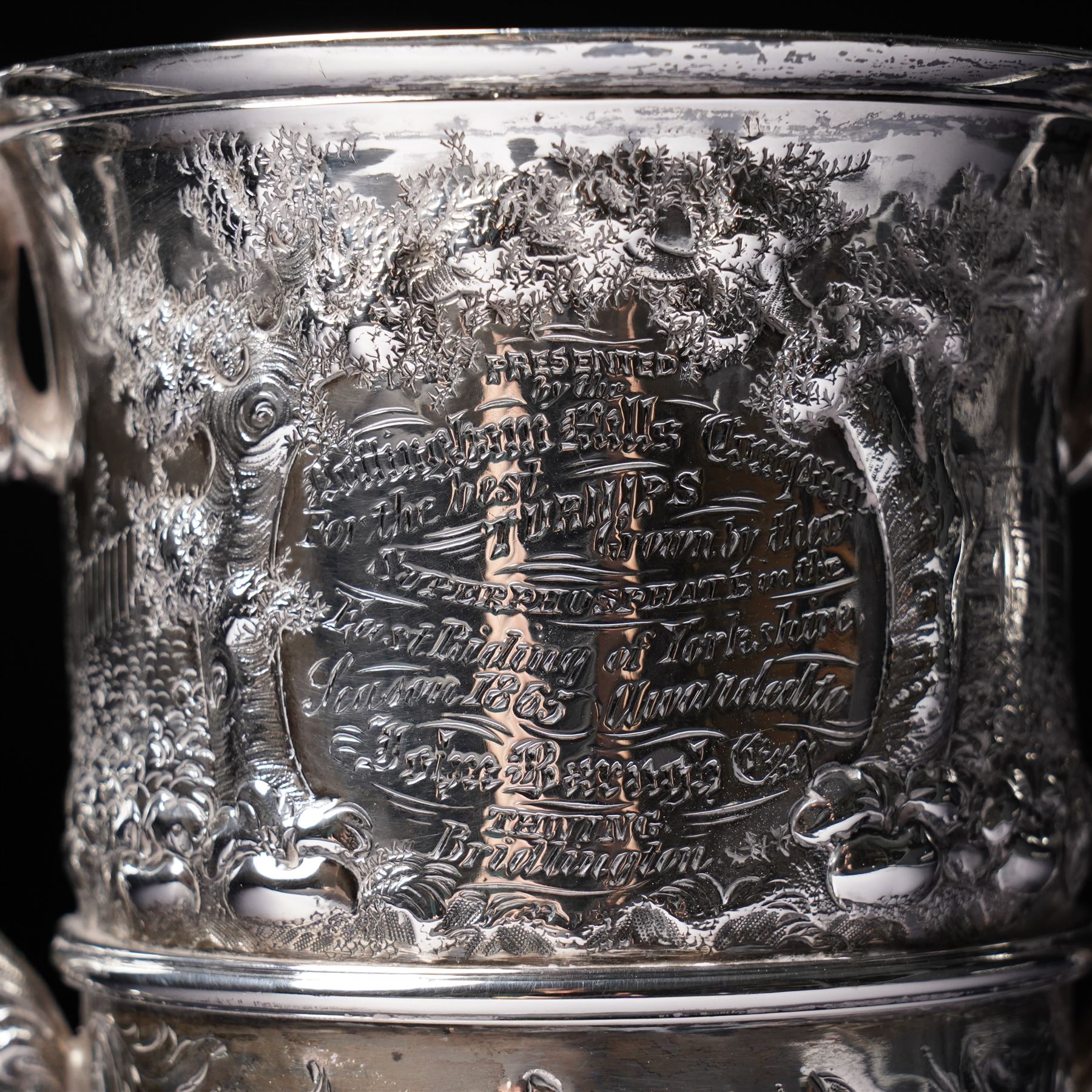 Victorian silver two handled cup embossed with cattle, horses and sheep and presented by Nottingham Mills Company to John Barugh, Thwing H16cm London 1865 Maker Henry Hollannd