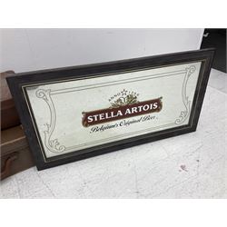 Three vintage leather brown suitcases, together with a Stella advertising mirror and Hornby and other trains