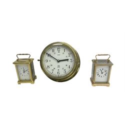 Two 20th century French carriage clocks and a Smiths ships wall clock, spring driven timepiece carriage clocks and a battery driven ships clock.