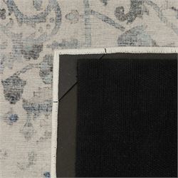 Ruggable - ‘Sarrah’ blue quartz flatwoven washable rug, ivory ground with blue and grey floral medallion, scrolling foliage and patterned borders, with a distressed effect finish, two-piece construction comprising a removable cover and separate pad, with a water-resistant and stain-resistant polyester barrier