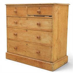 Victorian waxed pine chest, fitted with two short and three long drawers, turned wooden handles, raised on plinth base
