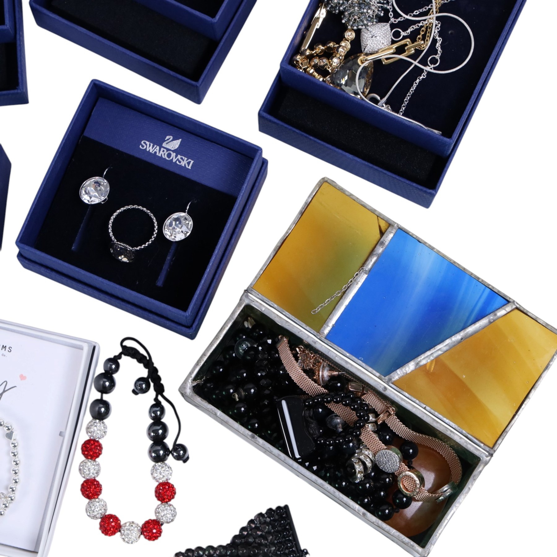 Collection of boxed Swarovski crystal jewellery, including statement necklaces, rings, bracelets and earrings, and a collection of costume jewellery including beaded necklaces