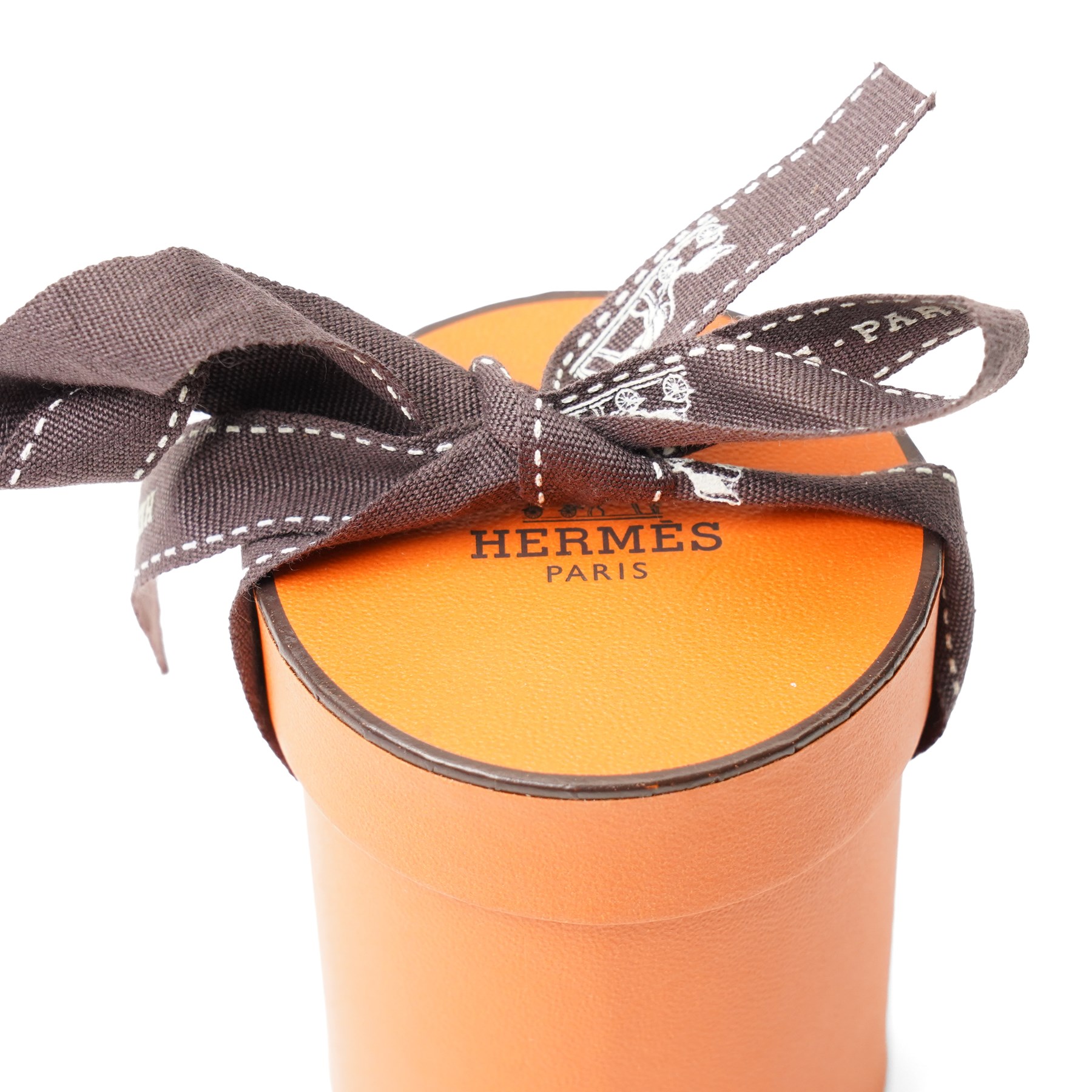 Hermès - leather tassel keyring or bag charm, taupe leather with palladium-tone split ring, with box