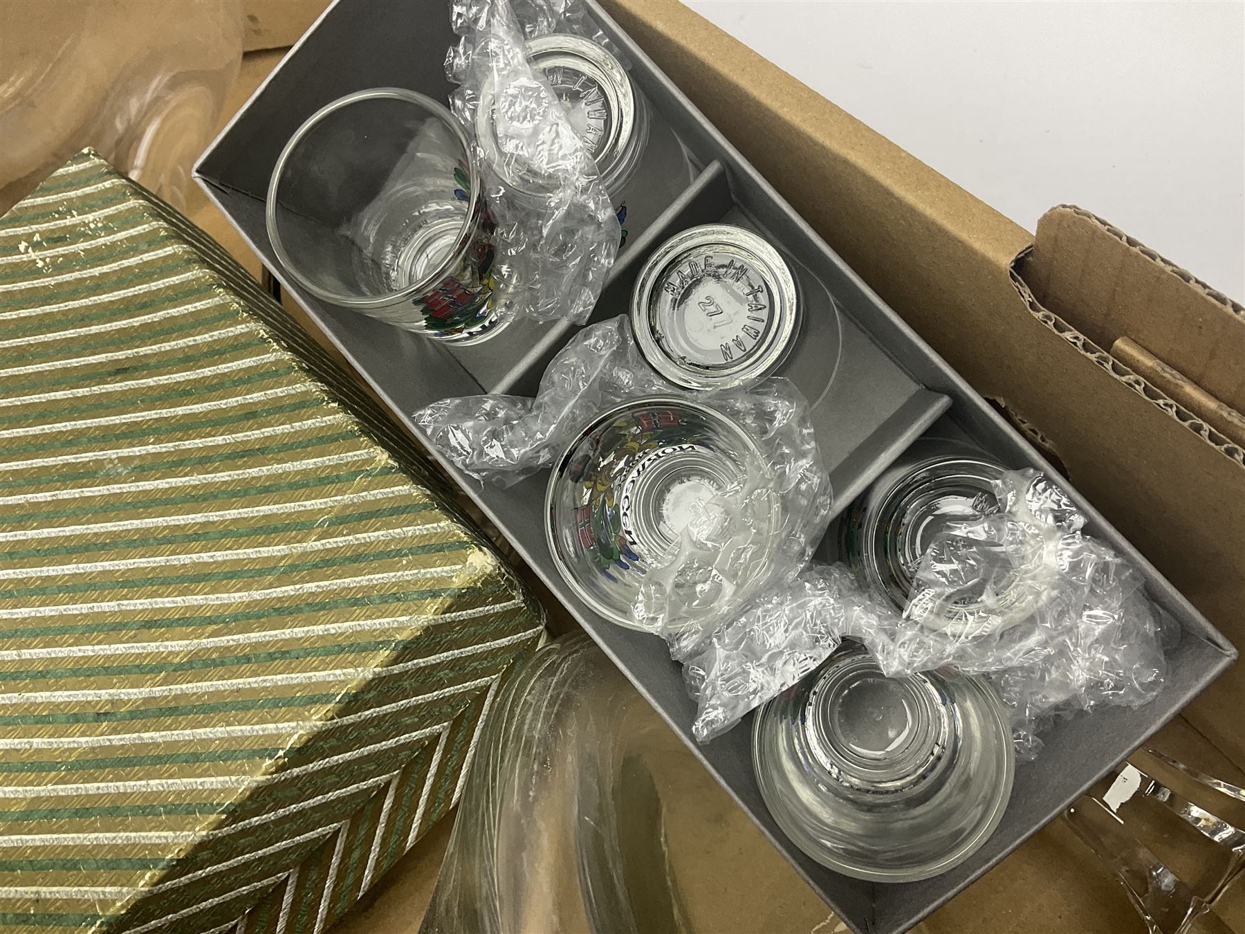 Dartington Crystal glass flower bowl, together with four similar smaller examples, two Orrefors glass bowls, collection of glass decanters, including Dartington and painted example, etc