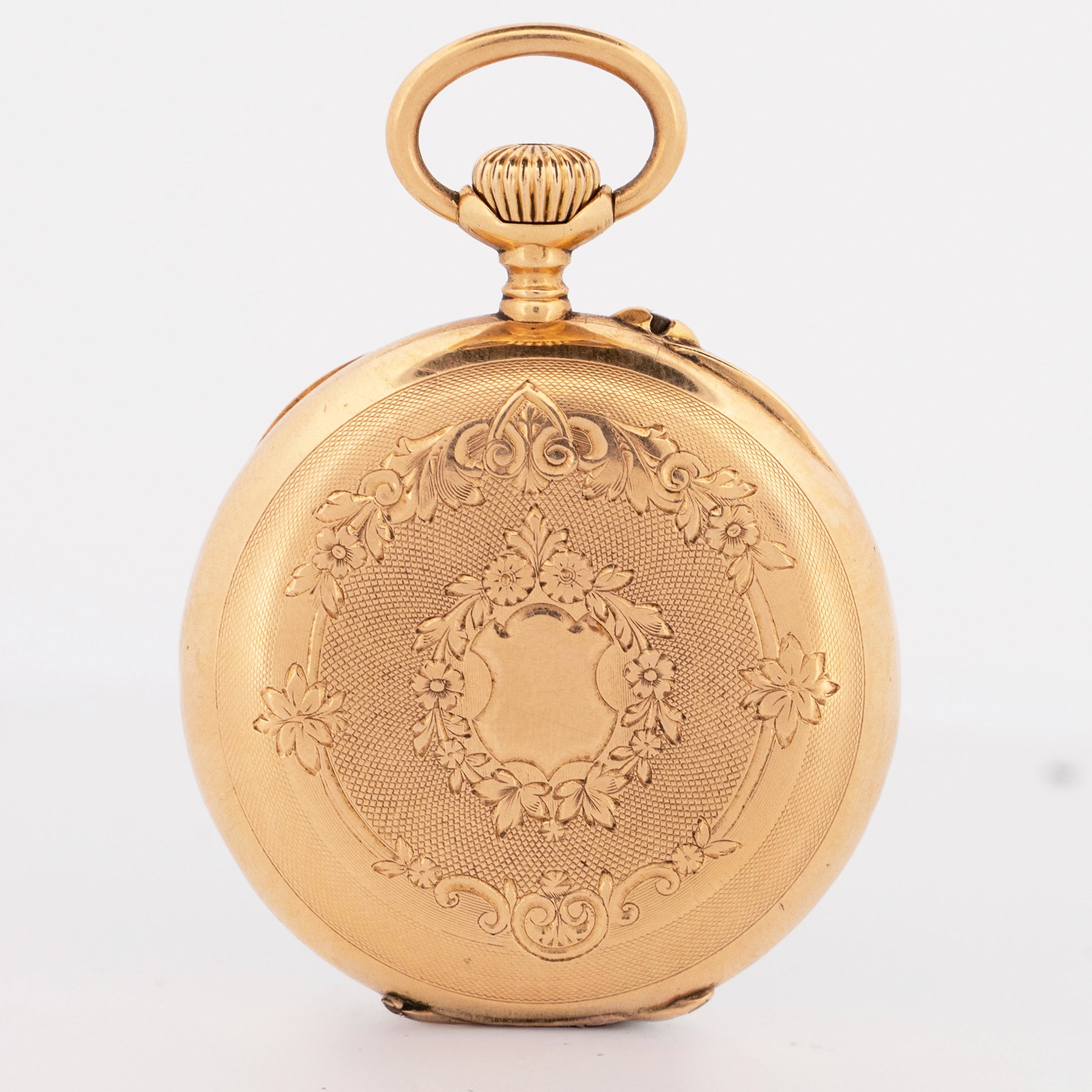 Early 20th century 18ct gold open face keyless lever fob watch by A. Bornand, Montreux, No. 6907, white dial with Roman numeral hour markers, sixty minute outer ring and subsidiary seconds dial, case with engraved foliate decoration and empty cartouche, stamped 18K with Helvetia hallmark