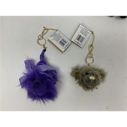 Five Charlie Bears Plush Hug Book Collection books, comprising Guide To Snuggleability containing Snuggleability CB191971F, Paw-Some Facts Directory containing Pawsome CB191971D, Bear Therapy Handbook containing Bear Therapy CB191971E, Study Buddy Handbook containing Study Buddy CB191971A, and Guide to Being Bear-illiant CB191971B, each designed by Isabelle Lee, each with tags, plus Charlie Bears Secret Hug Book (lacking contents), together with assorted Charlie Bear accessories, to include two Bear Ears Duffle headbands CBBEARSDUF, Egg Cup CB185198 , Incy Wincy CB205252AO, with tag, four key rings, all with tags, Bear Care Kit and contents, recipe cards, pin badges, tape measure, notebook, etc., (Qty)