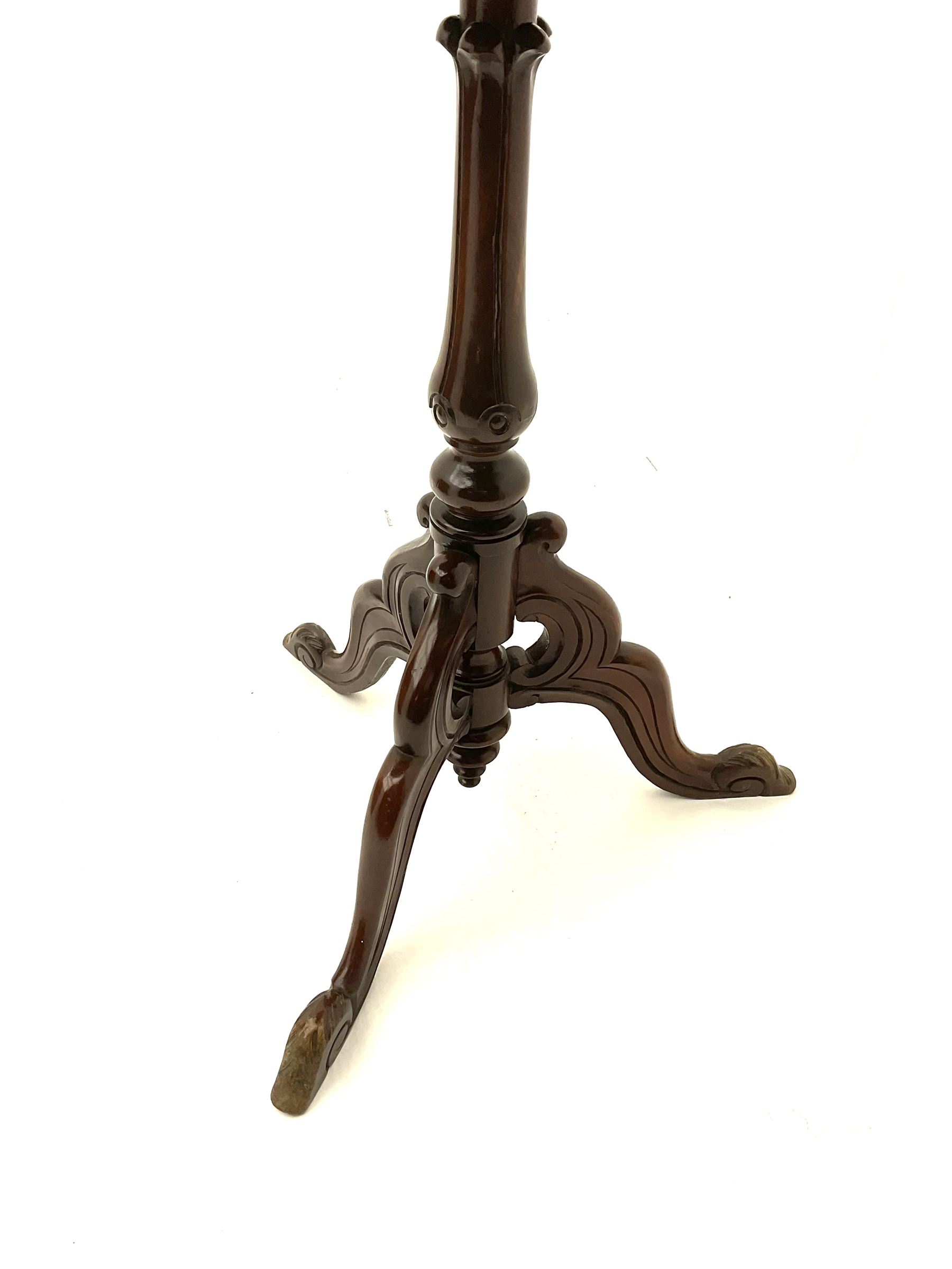 Victorian mahogany tripod table, shaped tilt top on turned and carved column, three shaped splayed supports the acanthus carved terminals