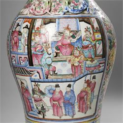 Large pair of 19th century Cantonese famille rose vases, each painted with various courtly scenes, including a display of warriors fighting on horseback before an official and his attendants, double Buddhist lion handles and applied at the shoulders with chilong, the lower band painted with Greek key motif, H58cm (2)