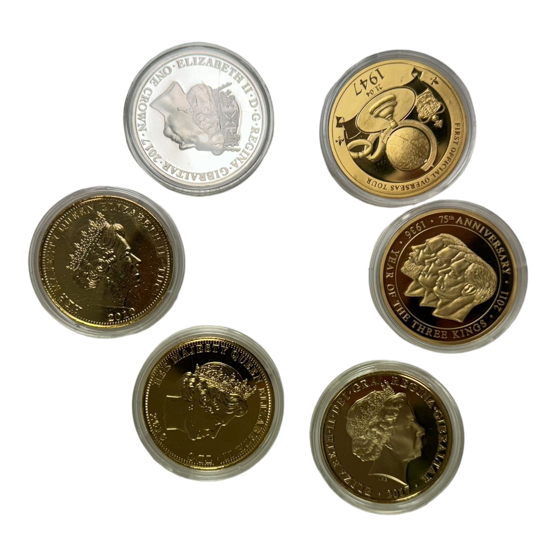 Mostly commemorative coins, medallions and fantasy coinage, including various 'Sainsbury's Makers of the Millennium' medal collection folders containing various medallions, The Toer Mint commemorative four medallion set in fitted case, Queen Elizabeth II 1982 silver proof piedfort twenty pence coin cased with certificate, various part filled The London Mint office folders etc