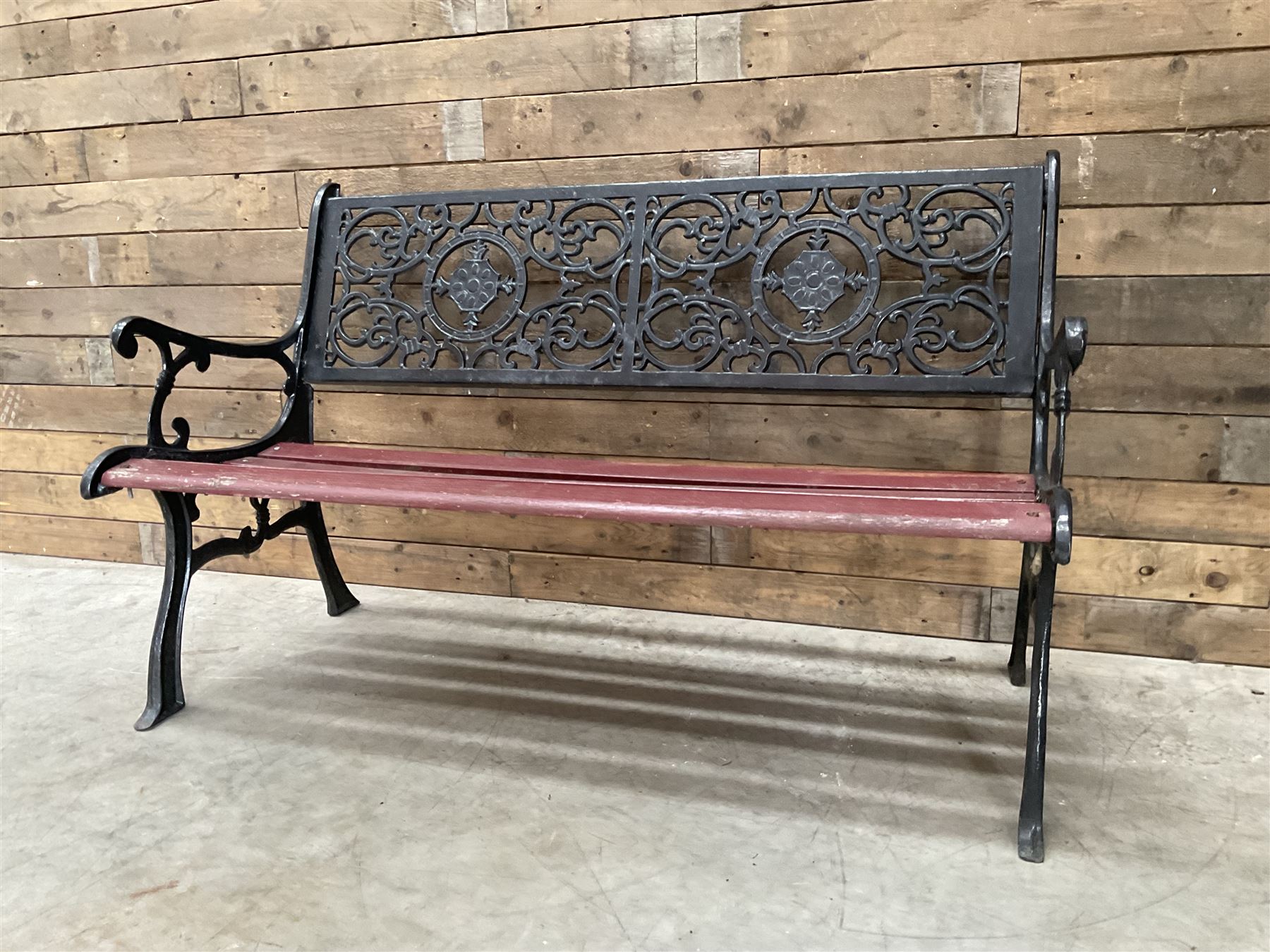Cast iron and wood slatted garden bench