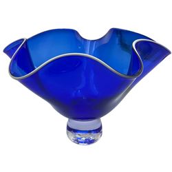 Gillies Jones of Rosedale dark blue glass vase with crimped rim on a short pedestal foot, signature to base, H11cm