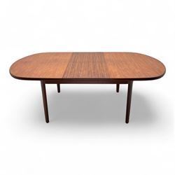 G-Plan - mid-20th century teak oval dining table, with butterfly leaf extension mechanism and four Elliot's of Newbury teak framed dining chairs upholstered in purple and green fabric, table un-extended width 152cm x depth 152cm x height 71cm, chairs 47x37x78cm 