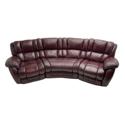 La-Z-boy - large three seat curved sofa, fitted with with end recliners, upholstered in maroon leather