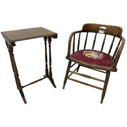 Early 20th century American oak smokers bow tub armchair, shaped cresting rail with pierced handle over ring turned spindle back, seat upholstered in pink tapestry fabric (W56cm, H73cm); small 20th century walnut occasional table on turned supports (W43cm, H70cm, D33cm)