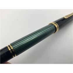 Pelikan M800 Souveran fountain pen, the green and black striped barrel with gilt beak shaped clip and double cap band with gold bi-colour nib stamped 18C-750, L13.5cm
