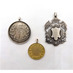  9ct gold medal, Whitby Regatta 1934 hallmarked 3.2gm and two hallmarked silver medals   