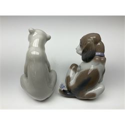 Five Lladro figures, comprising Cat and Mouse no. 5236, That Tickles no. 5888, Gentle Surprise no. 6210, Little Hunter no. 6212 and Resting Polar Bear no. 1208, largest H12cm