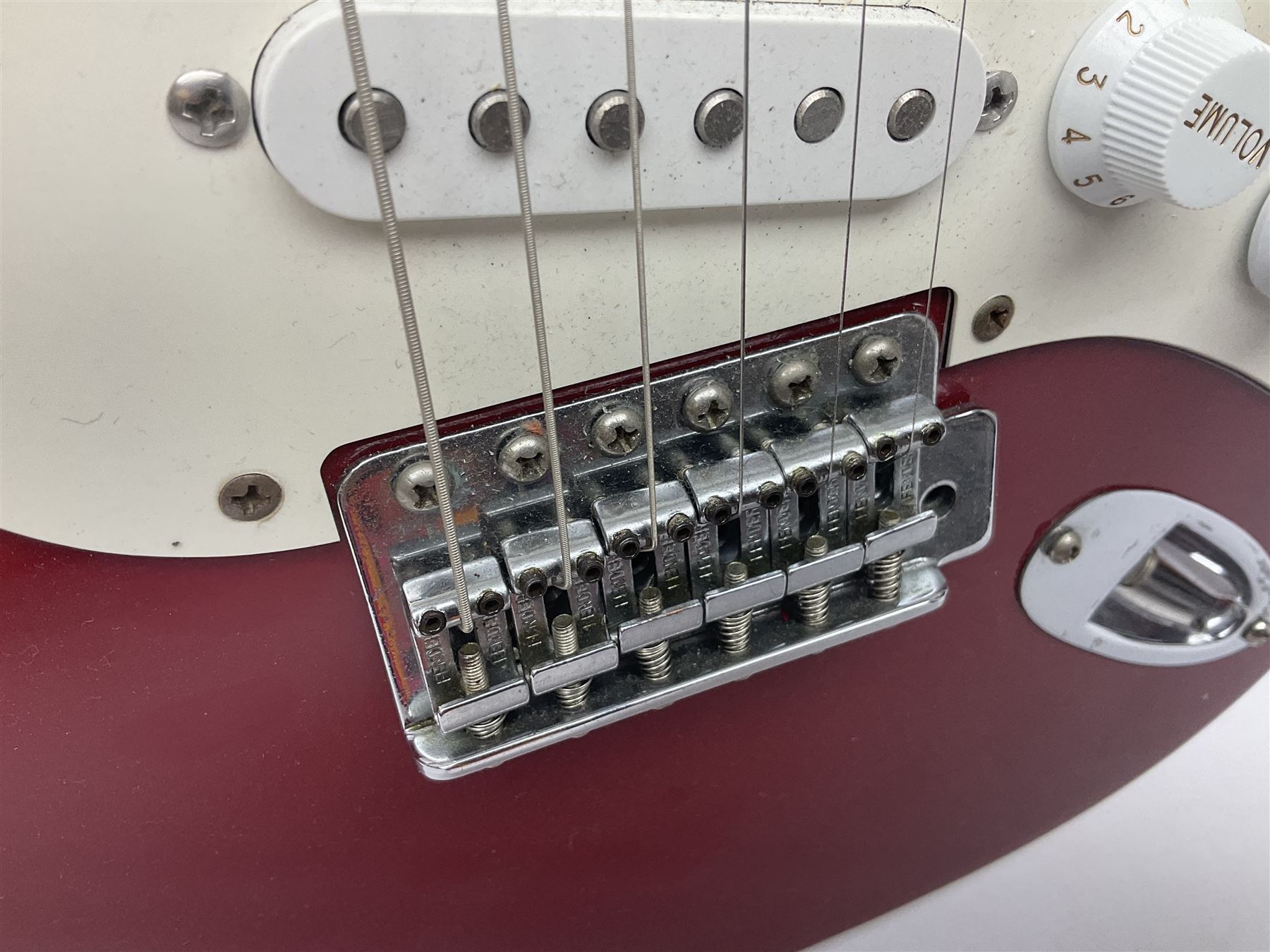 1990s Korean Squier Fender Stratocaster electric guitar in cherry red; serial no.S965951, L98cm