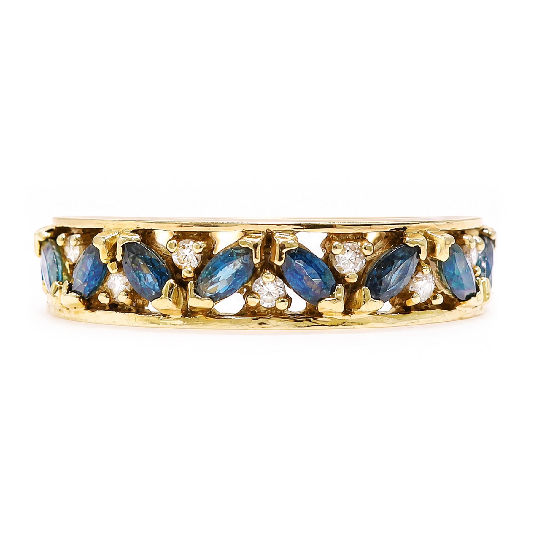 18ct gold sapphire and diamond full eternity ring, sixteen marquise cut sapphires, each spaced by a round brilliant cut diamond, London import mark 1992