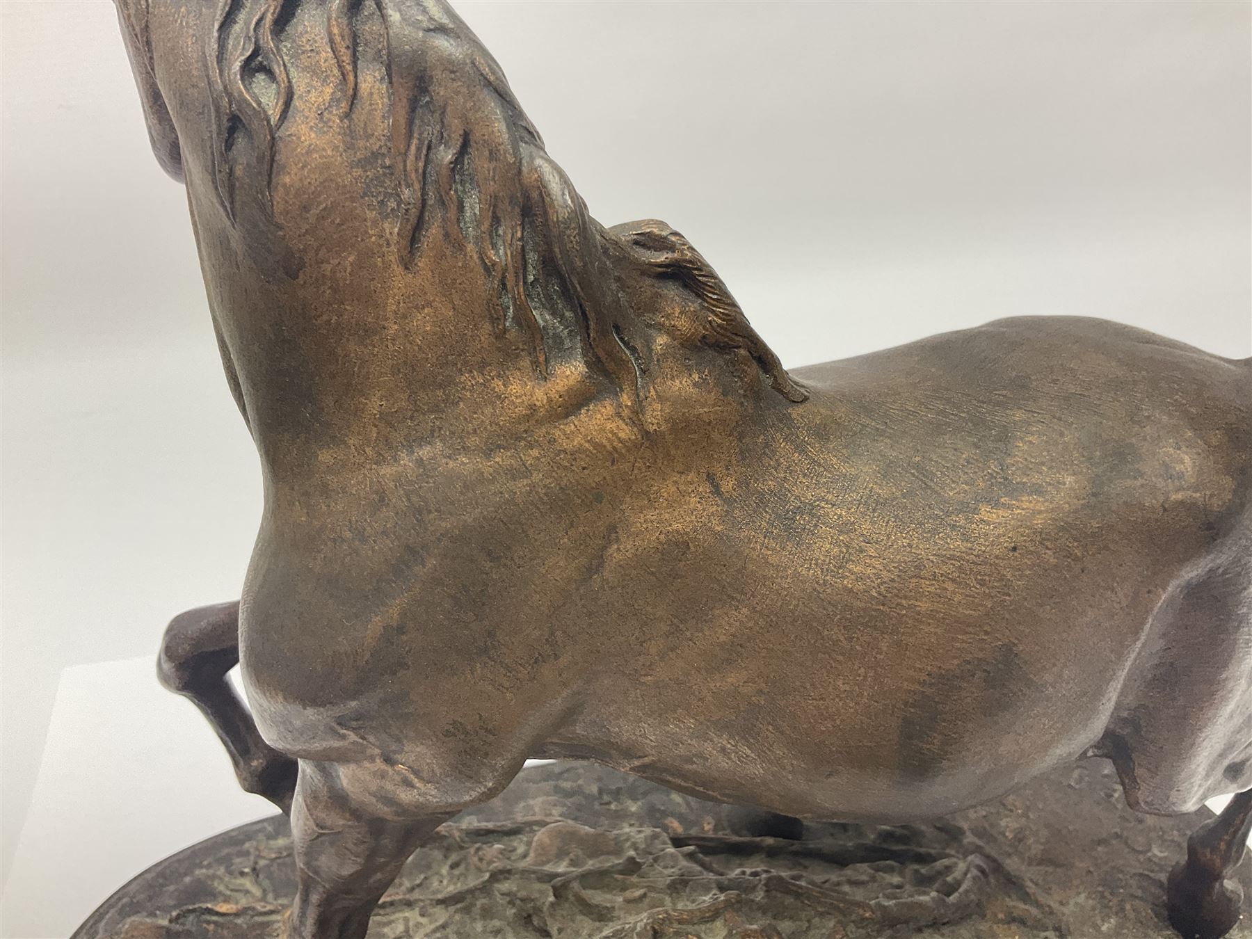 After P J Mene, bronze figure of a horse on a stepped oval base, H31cm 